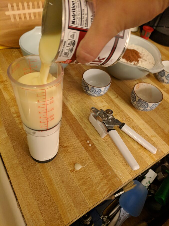 Measuring evaporated milk.